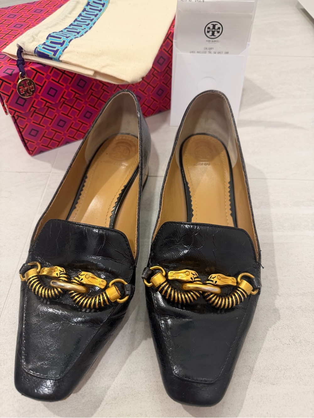 Tory Burch Jesse Stamped Snake Black Leather Loafers with Gold Chain Detail